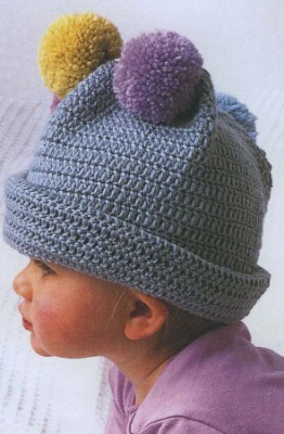 Схемы вязания для малышей. Шапочка с помпонами или с кисточками.